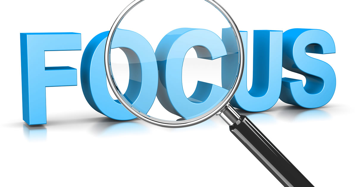 Graphic of magnifying glass over the word focus