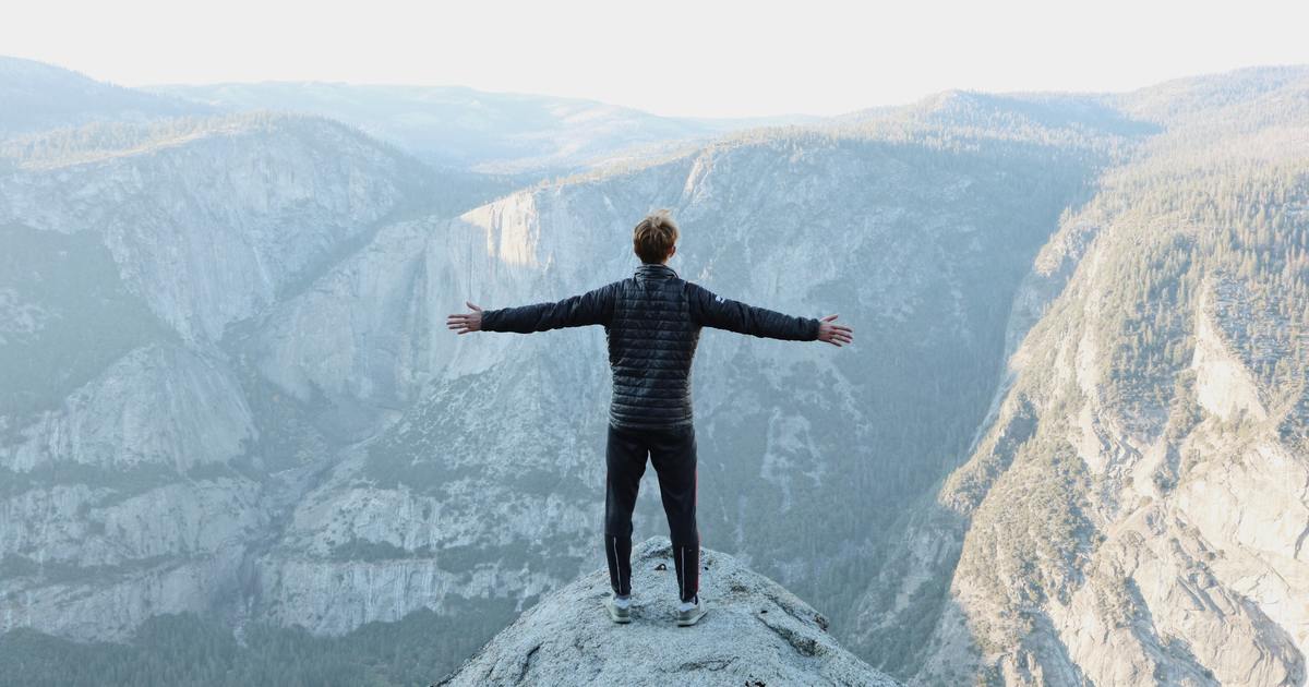 Man standing near a cliff edge