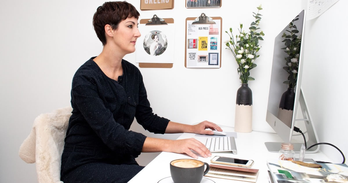 Woman working on computer at a desk