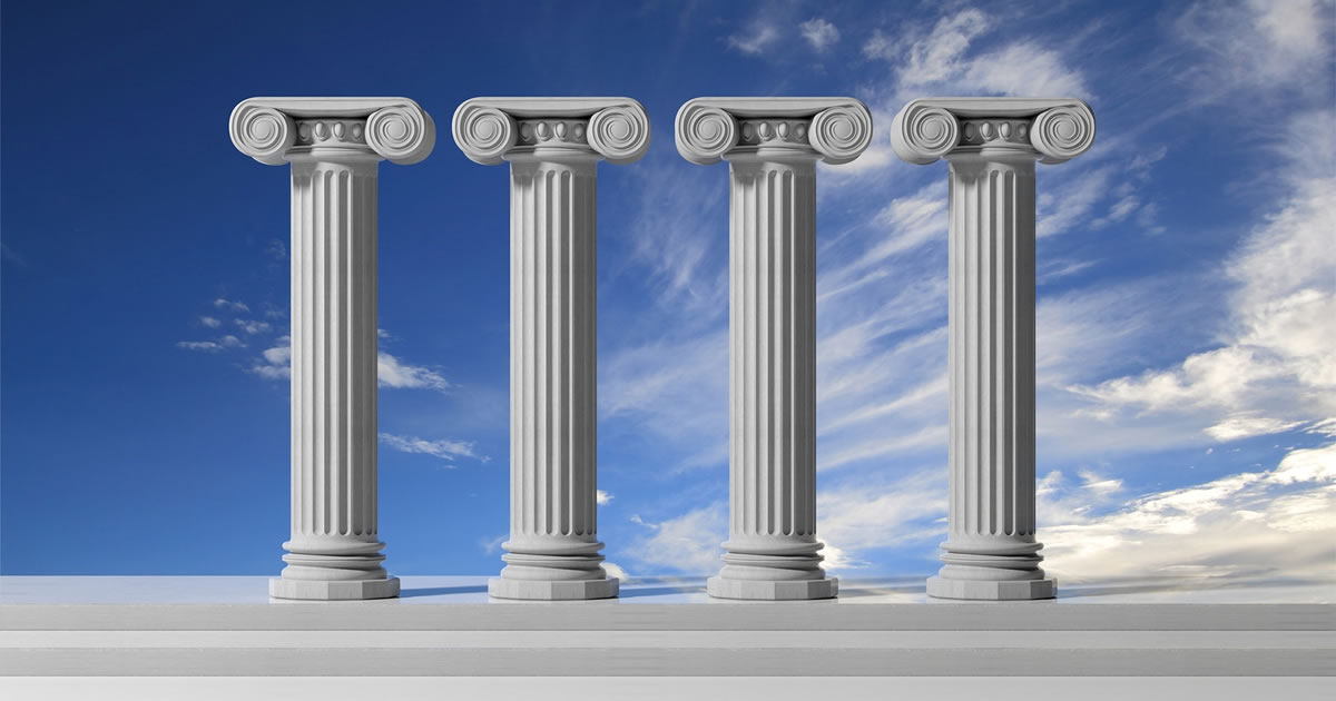 4 solid ancient pillars again a blue sky background