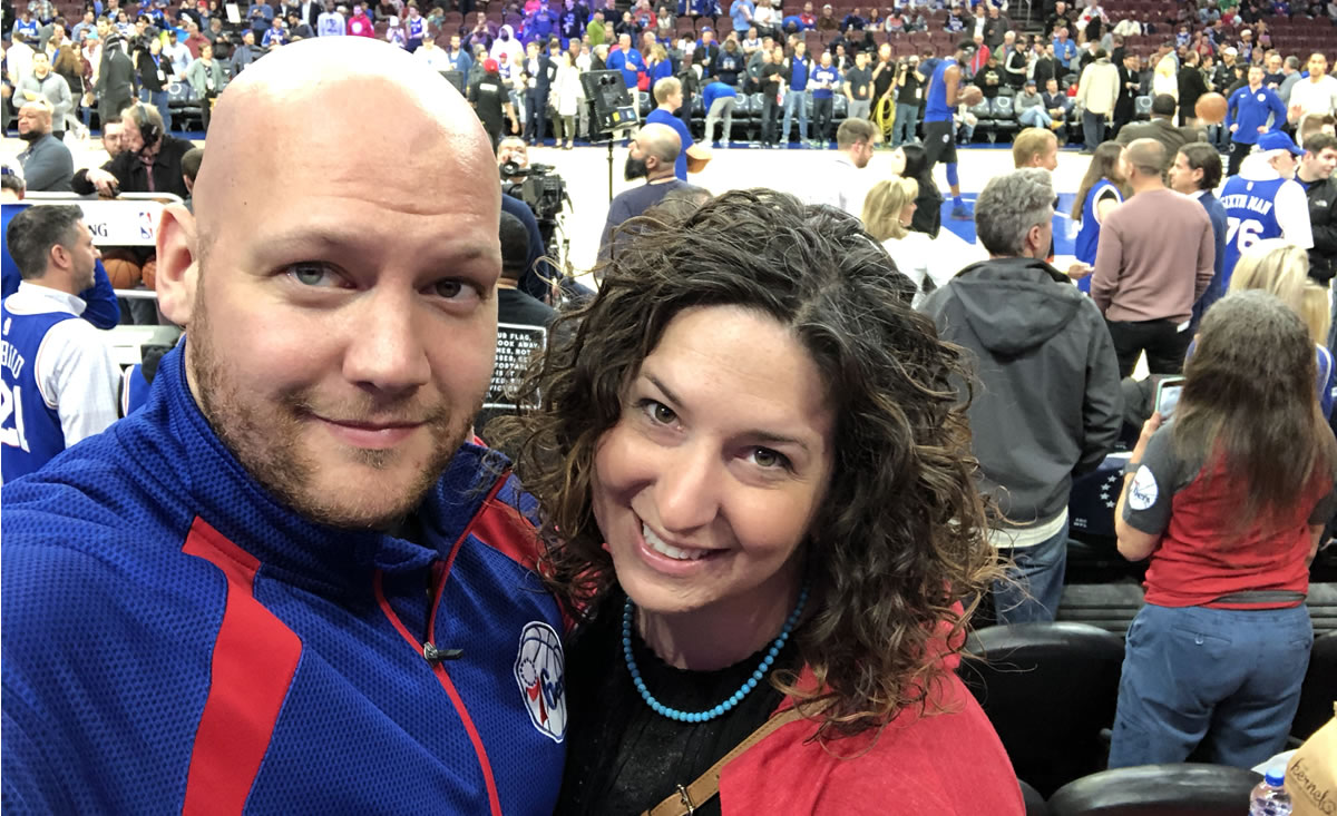 Henry Bingaman and his wife, Kerri, at a Philadelphia 76ers playoff game