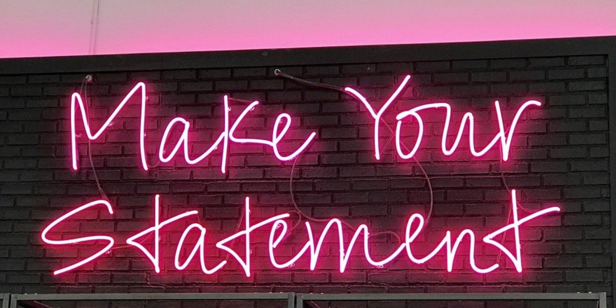 Make Your Statement sign in neon lights