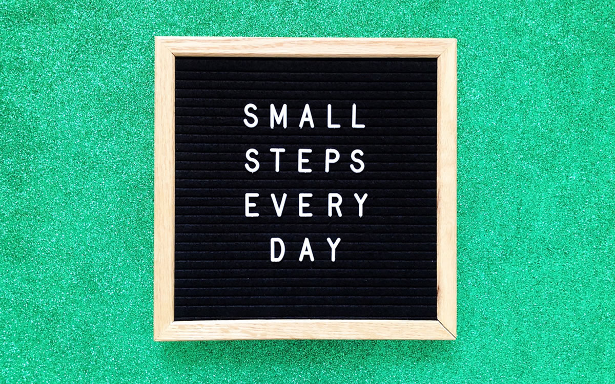 Sign that reads, Small Steps Every Day