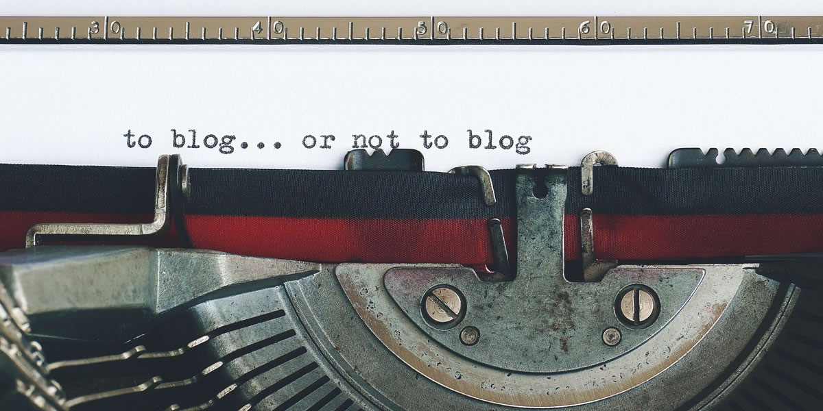 Closeup of typewriter with the words to blog or not to blog