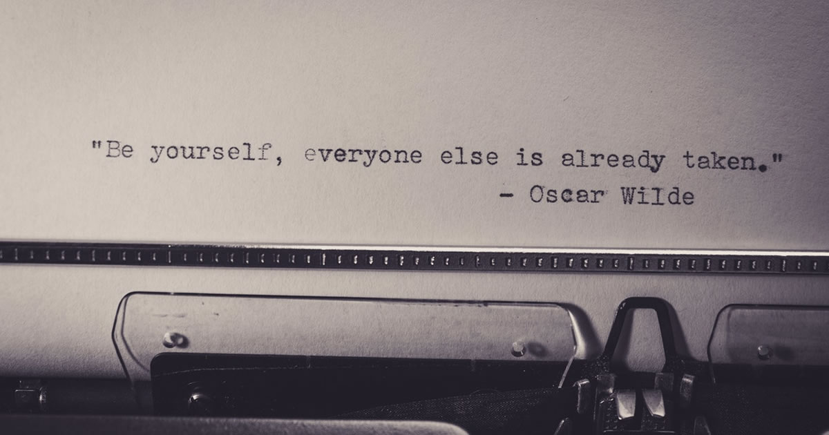 vintage typewriter with words typed on white paper be yourself everyone else is already taken
