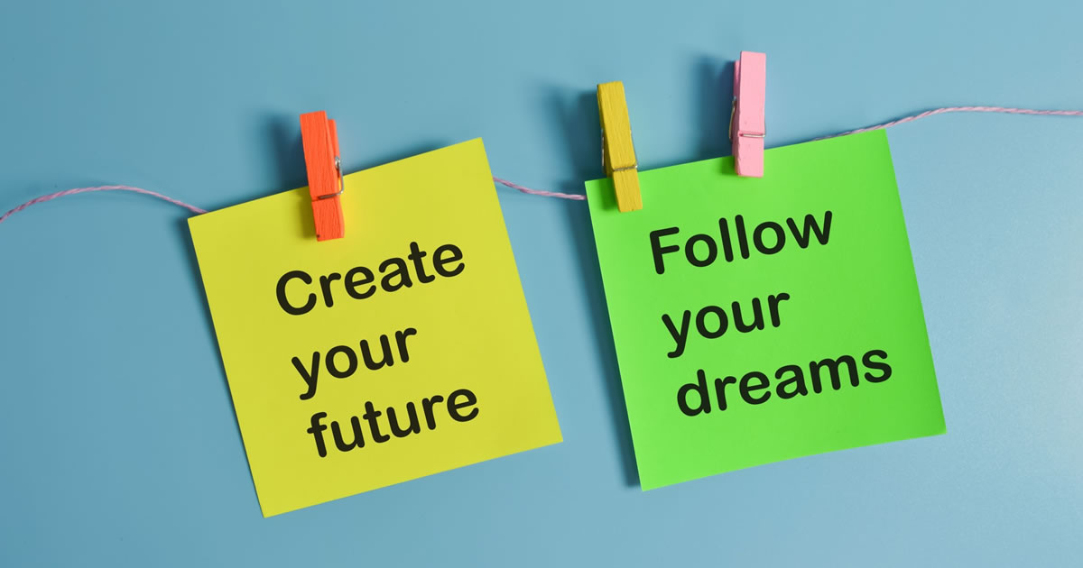 Colorful paper notes written with CREATE YOUR FUTURE and FOLLOW YOUR DREAMS