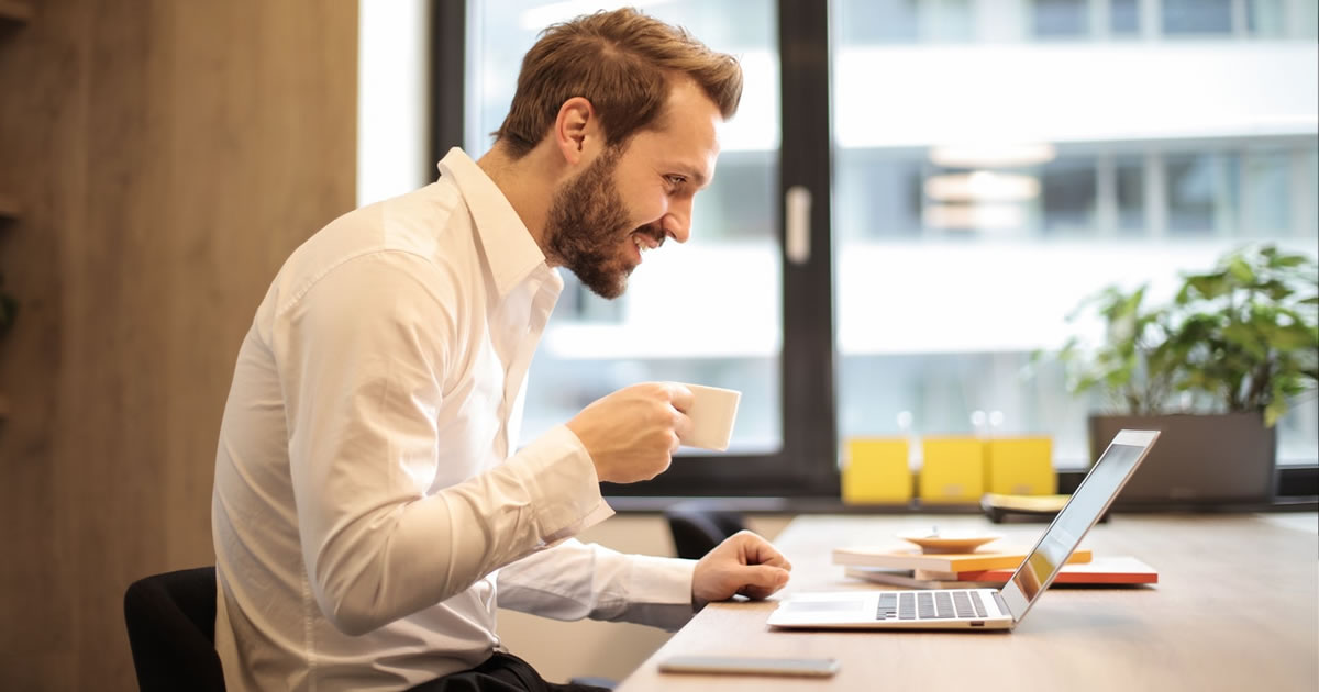 businessman working on laptop at desk