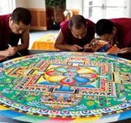 Image of monks working on a quilt