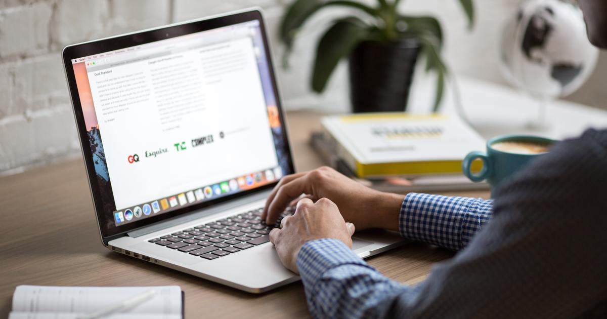 Man writing a newsletter