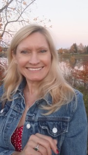 Irene enjoys an afternoon stroll
	by the lake near her home.