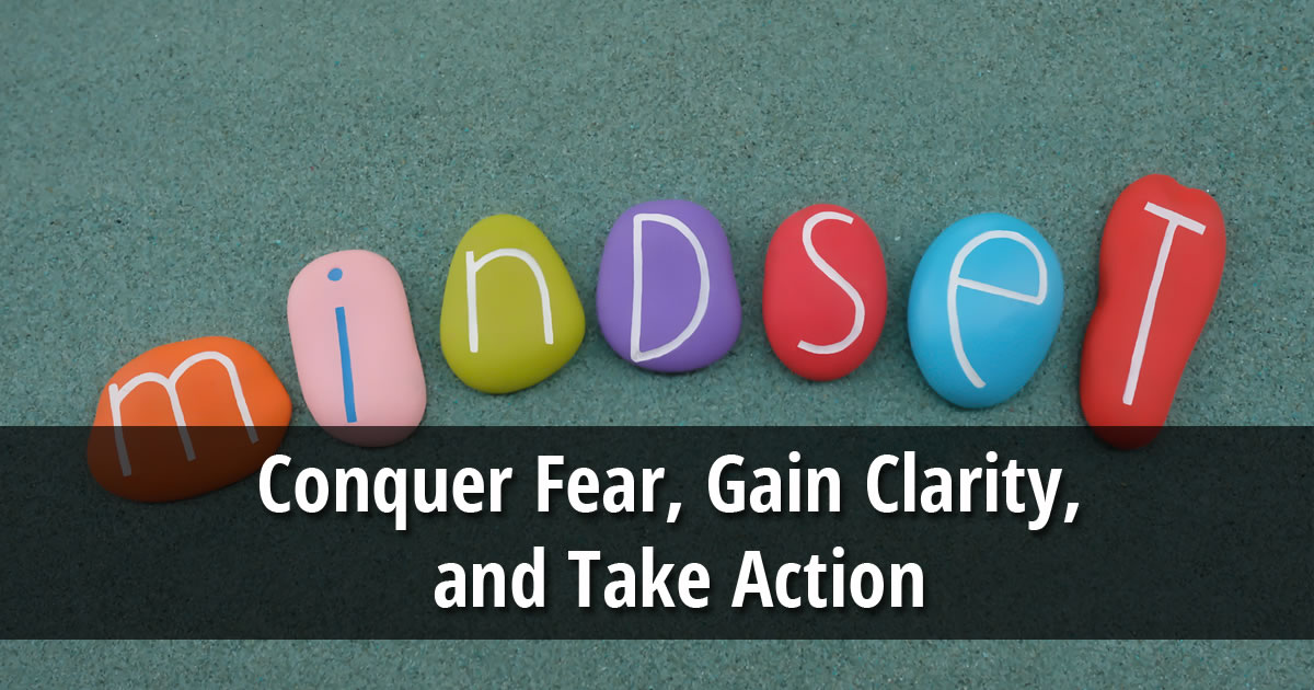 Smooth colorful rocks spelling out the word mindset with overlay of text that says Conquer Fear, Gain Clarity, and Take Action